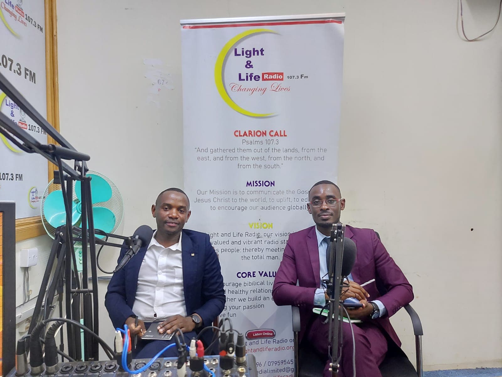 Two advocates of Mwita & Co. speaking on air during a Light & Life Radio 107.3 FM interview.